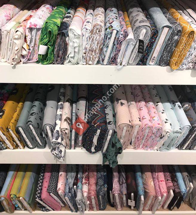 Uglemor As - Sy strikk og barneklær